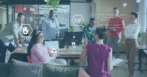 Team Collaborating in Office with Digital and Ecology Icons Overlay