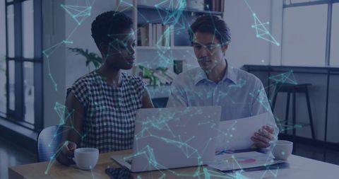 Business People Analyzing Data with Digital Network Overlay