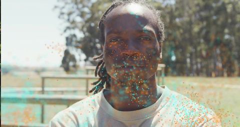 Confident Man with Dreadlocks in Vivid Artistic Style outdoors