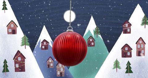 Glossy red christmas ornament hanging over snowy mountain village under moonlit snowfall