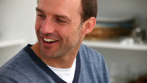 Smiling Man in Casual Setting