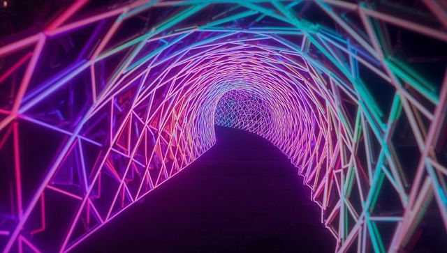 Vibrant neon tunnel with geometric patterns