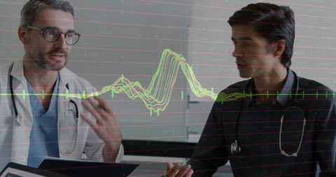 Doctors Discussing Diagnosis with Futuristic Datagraph Overlay - Download Free Stock Images Pikwizard.com
