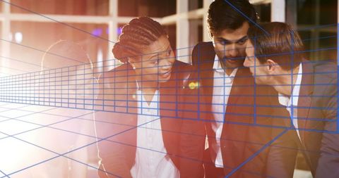 Diverse Business Team Strategizing with Digital Overlay Effect