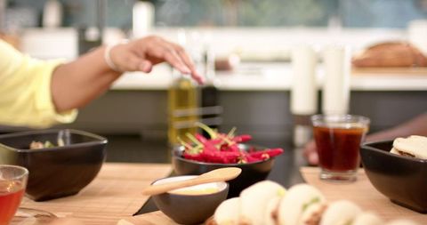 Friends Dining Casually with Tacos Drinks and Olive Oil