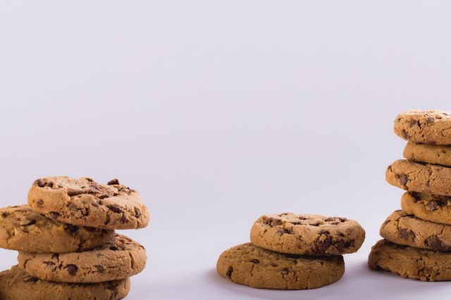 Stack of cookies over white background with copy space. unaltered, food, studio shot and snack.