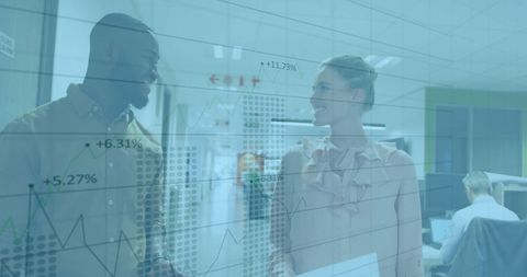 Financial data overlay with diverse business professionals in office
