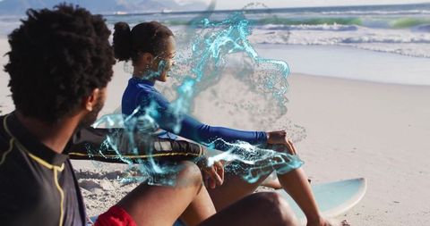 Friends relaxing on beach with surfboards and creative water effects