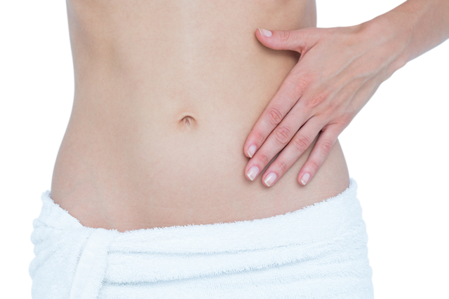 Transparent image of woman touching abdomen wrapped in white towel - Download Free Stock Videos Pikwizard.com