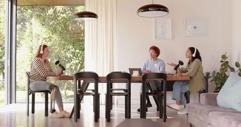 Creative Female Podcasters Recording in Stylish Home Studio Setup