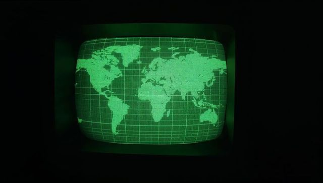 Retro CRT Monitor with Glowing Green World Map Display