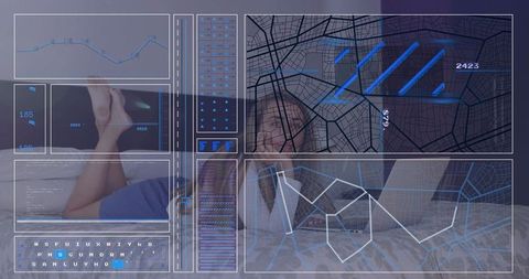 Woman working from bed with digital holographic projections