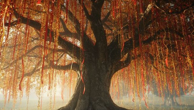 Mystical Tree with Red Ribbons and Golden Beads at Sunrise