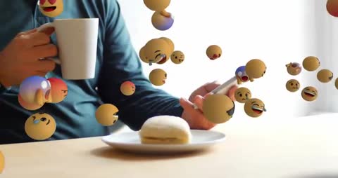 Man Engaging on Smartphone with Virtual Emojis Swirling
