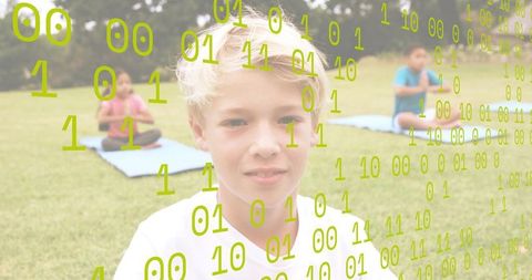 Blonde boy practicing yoga on lawn with binary code overlay, kids meditating outdoors