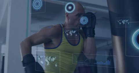 Middle-aged boxer training with punching bag and digital hud fitness overlays