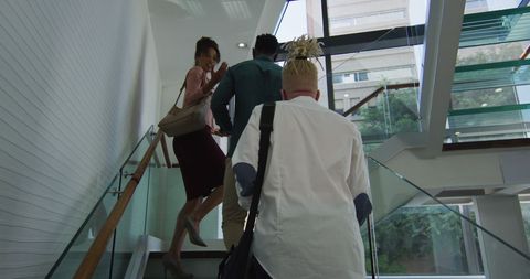 Diverse Team Collaborating in Modern Office Staircase - Download Free Stock Images Pikwizard.com