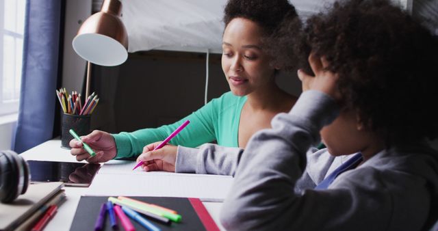 Mother Helping Child with Homework in Study Room - Download Free Stock Images Pikwizard.com