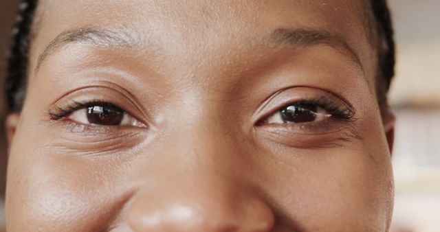 Close-Up of African American Woman's Eyes with Playful Expression - Download Free Stock Images Pikwizard.com