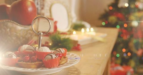Festive Christmas Desserts and Decorated Tree Background - Download Free Stock Images Pikwizard.com