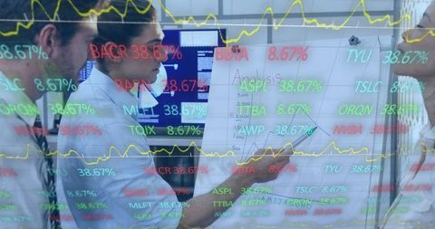 Business Team Analyzing Stock Market Data for Financial Strategy