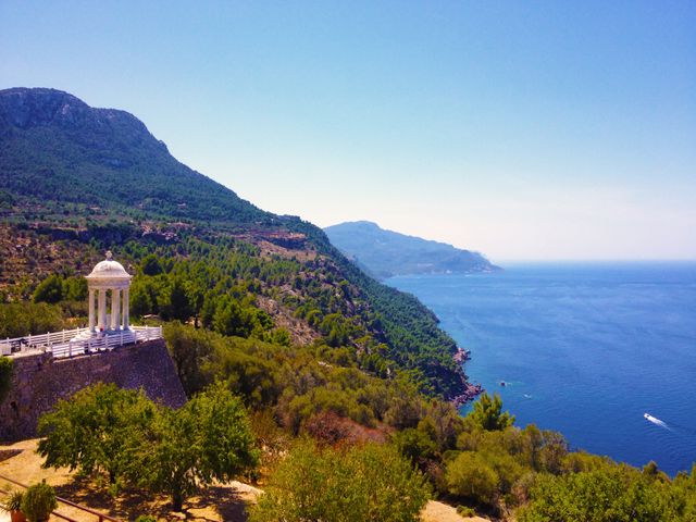 Scenic Coastal View with Mountainous Landscape and Pavilion - Download Free Stock Images Pikwizard.com