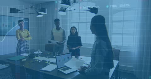 Diverse Team in Modern Office Analyzing Financial Data Projections