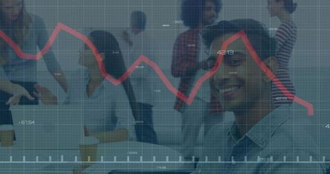 Smiling Professional with Declining Graph in Modern Office