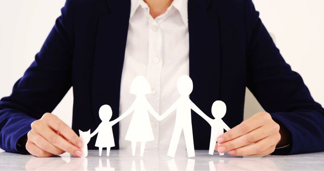 Person Holding Paper Cutout of Family - Download Free Stock Images Pikwizard.com
