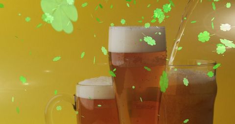 Floating Shamrocks Over Pints of Beer for St Patrick's Day Celebrations - Download Free Stock Images Pikwizard.com