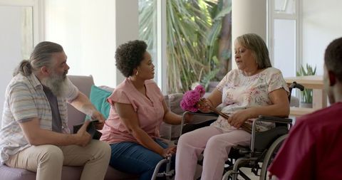 Senior People Socializing in Cozy Living Room