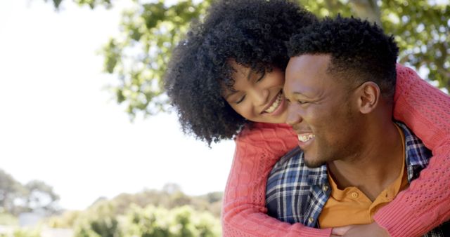 Smiling couple enjoying time together outdoors on sunny day - Download Free Stock Images Pikwizard.com