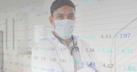 Asian Male Doctor Analyzing Data with Graph Overlay in Medical Corridor