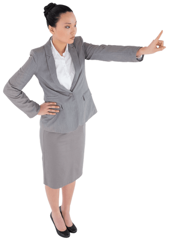 focused asian businesswoman pointing with confidence on transparent background - Download Free Stock Videos Pikwizard.com