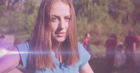 Volunteer Smiling During Earth Cleanup in Countryside