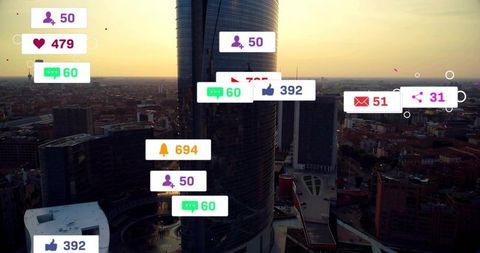 Glass tower reflecting sunset with floating social media badges over city plaza