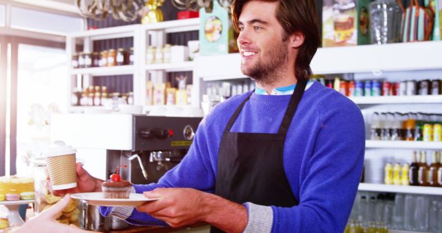 Friendly barista serving customer in cozy coffee shop - Download Free Stock Images Pikwizard.com