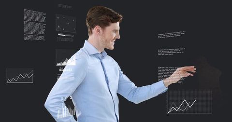 Adult man interacting with holographic data visualization and analytics interface