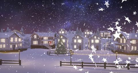 Village plaza at night with illuminated christmas tree and snow