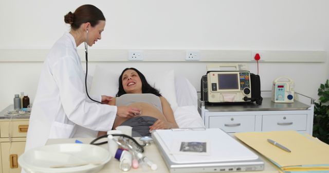 Happy Pregnant Woman during Prenatal Visit with Doctor - Download Free Stock Images Pikwizard.com