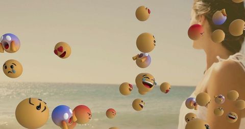 Woman enjoying seaside breeze with playful 3d emoticons
