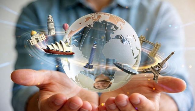 Hands holding floating globe orbiting famous landmarks airplane hot air balloon
