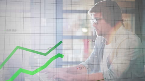 Man Analyzing Data with Graph Overlay at Desk