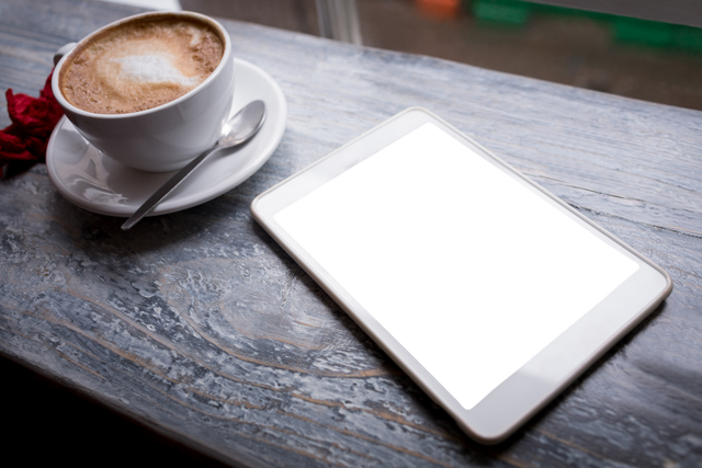 Transparent Coffee Cup with Cappuccino Beside Digital Tablet - Download Free Stock Videos Pikwizard.com