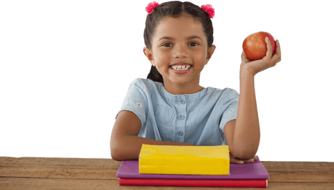 smiling girl holding apple at desk with transparent background - Download Free Stock Videos Pikwizard.com