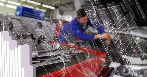 Technician inspecting red industrial machine with hud data overlays and factory analytics
