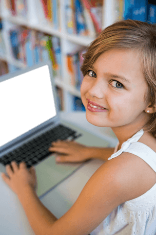 Transparent smiling girl using laptop in library