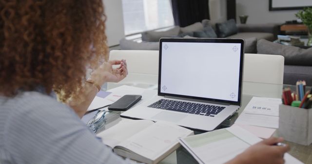 Person working at desk with laptop in modern home office - Download Free Stock Images Pikwizard.com