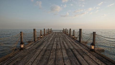 Tranquil wooden dock with candle lanterns in calm louisiana seascape