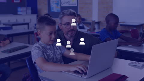 Children and Teacher Collaborating in Classroom on Digital Technology